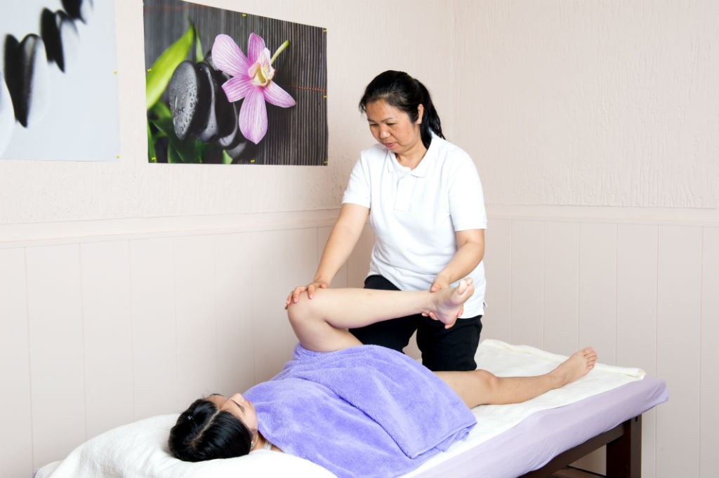 Thai-Massage Knie und Bein